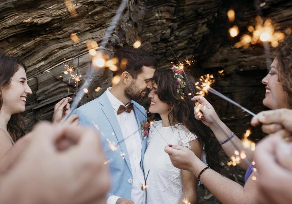man-woman-celebrating-their-wedding-beach
